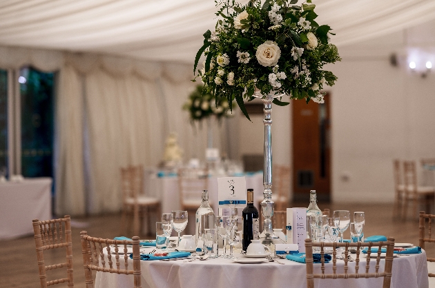 wedding table adorned with white flowers