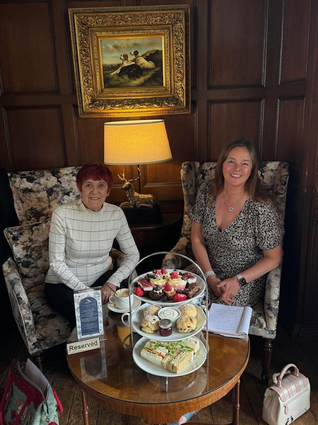 two ladies enjoying afternoon tea