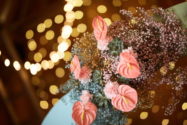 teal and pink floral arrangement