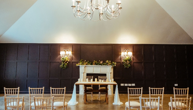 wedding set up in front of fireplace