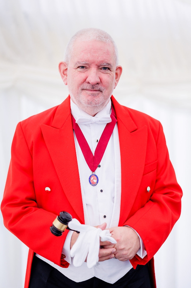 Michel in red toastmaster outfit