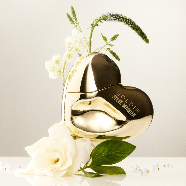 heart-shaped bottle with a shiny gold finish