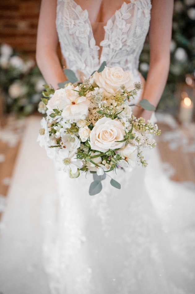 close up of bridal bouquet with white flowers