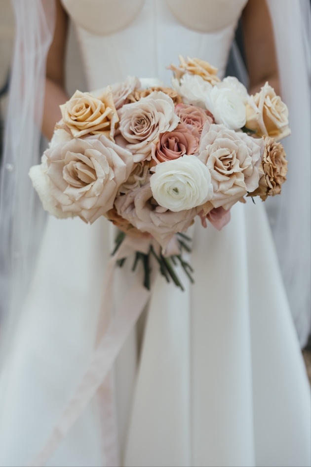 closeup of bride holding her bouquet