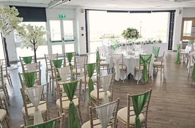 wedding breakfast interior room with white tables