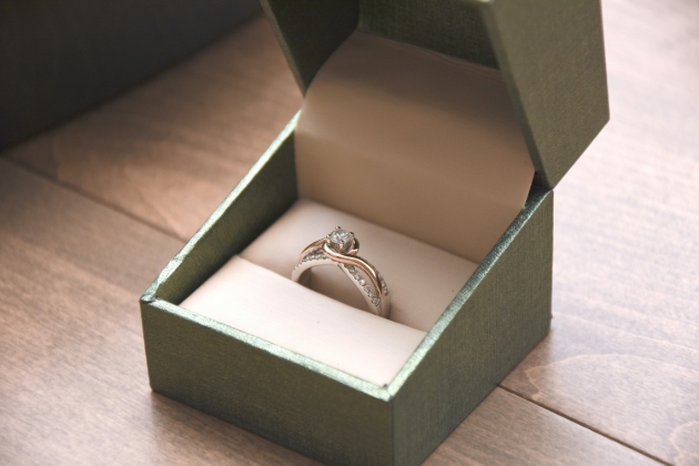 Diamond ring in sage green ring box