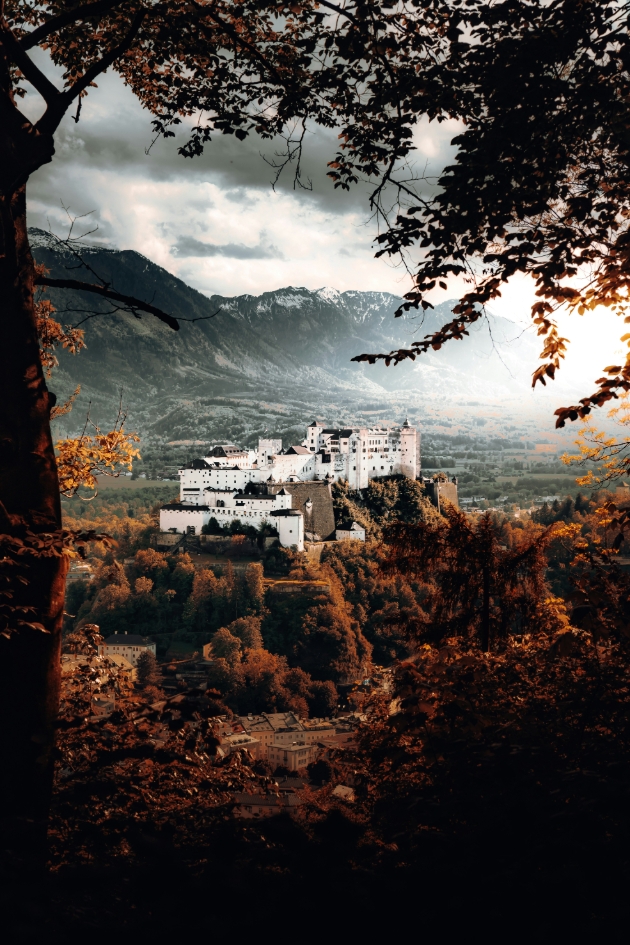 white mansion in the mountains in salzburg